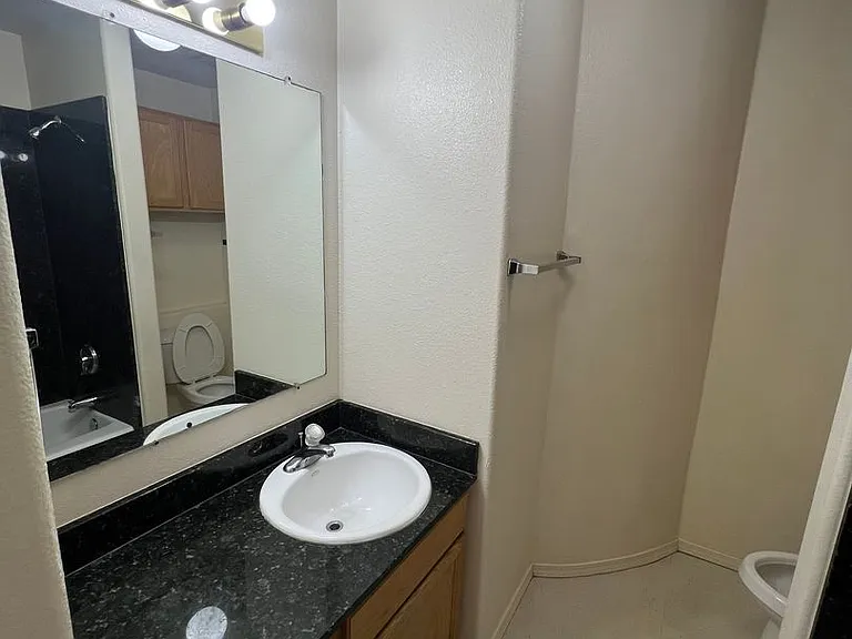Modern Condo-Style Living Near Nob Hill & UNM $300 Off Move-In Special at The Spirals Apartments — Photo 16