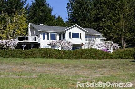 52 Sunrise
						:
						View from SE on two-acre property