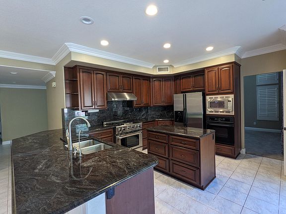 Large gas range and wall oven along with a generous counter space make this a great kitchen for entertaining!