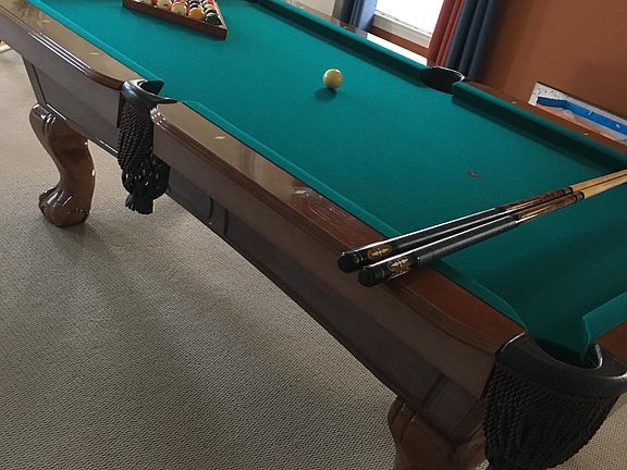 Formal Dining which turned into rec room. Pool Table may stay if desired.