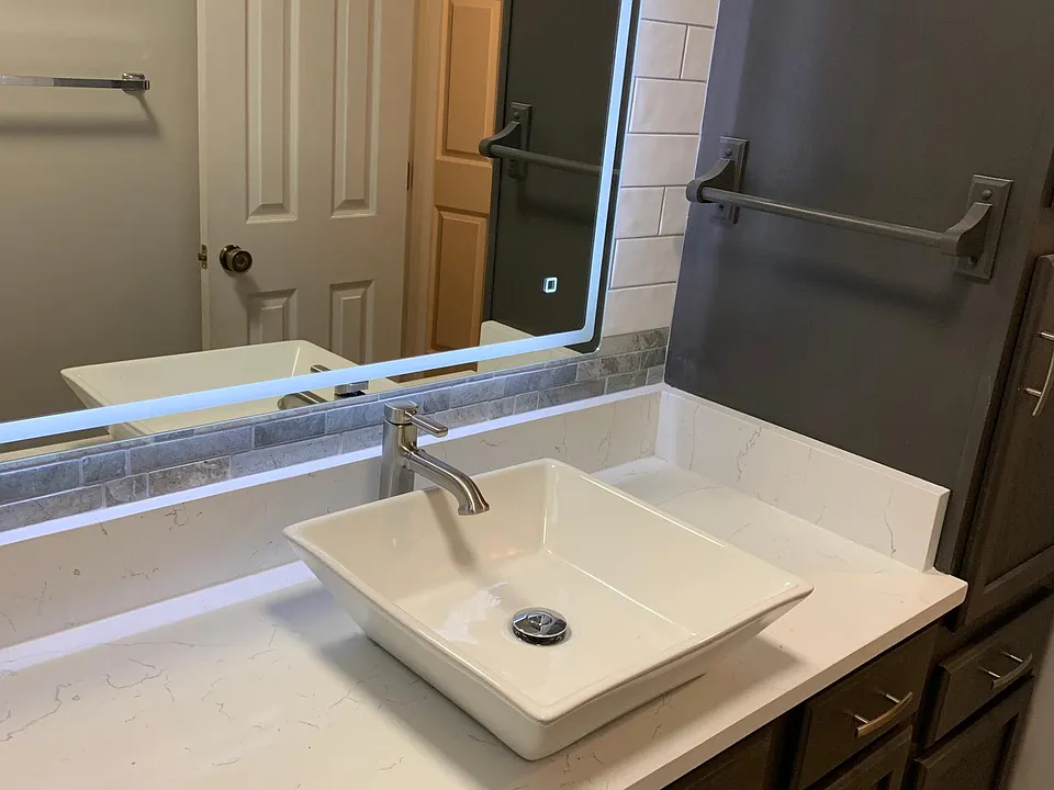 New backsplash, tile, quartz counters,bluetooth mirror, lots of storage, Main Bath