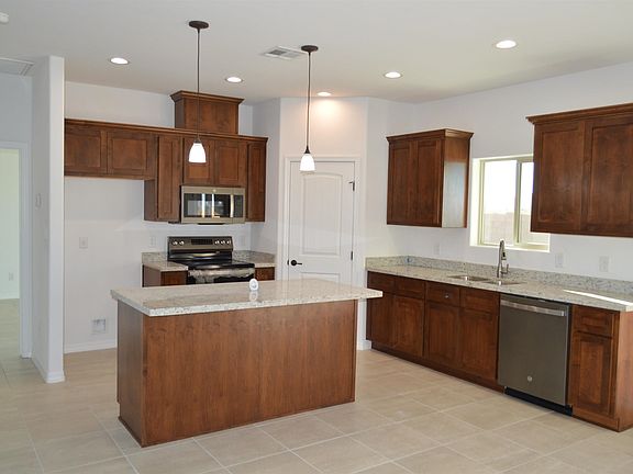 5th image of 13141 E 55th Ln