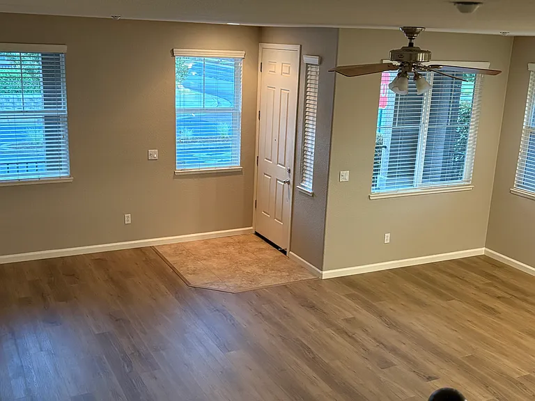 Entrance, living and dining room from stairs