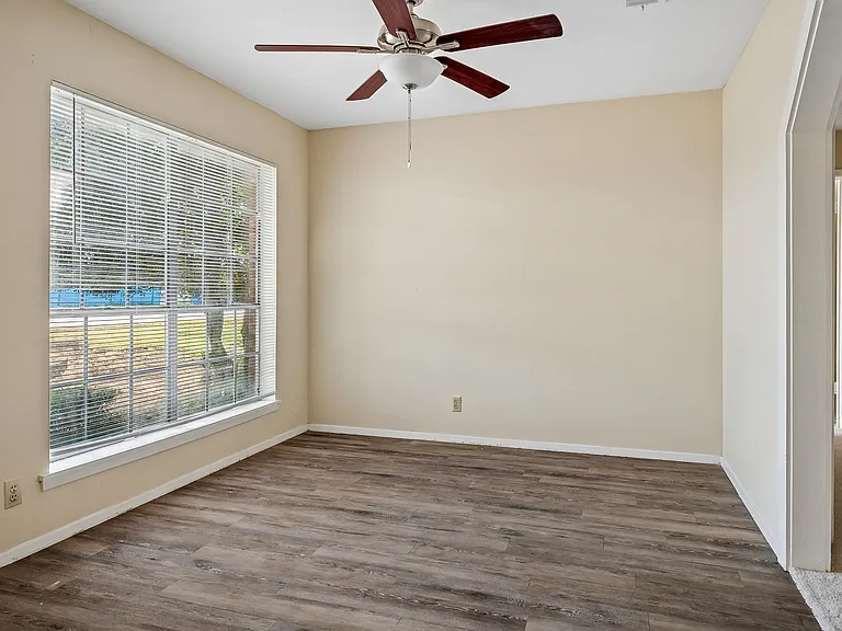 Formal living area with wood floors or flex space for home office