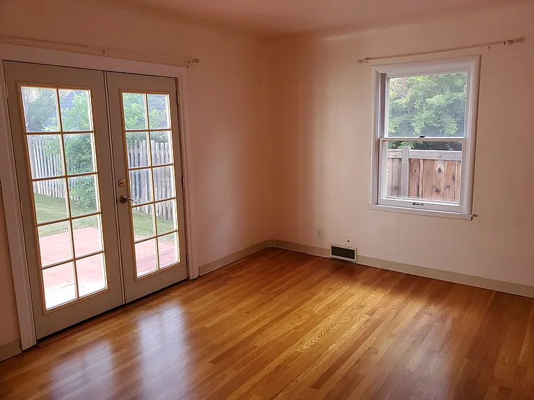 Master bedroom has French doors to the backyard patio.