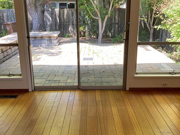 View onto your patio. Windows will be replaced this summer with new double pane.