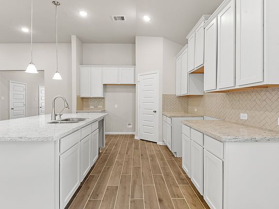 Abundant cabinet and counterspace