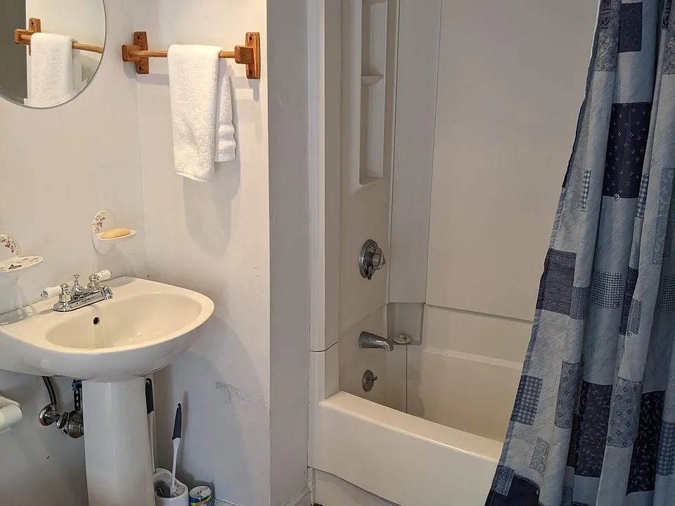 Bath with tub and shower