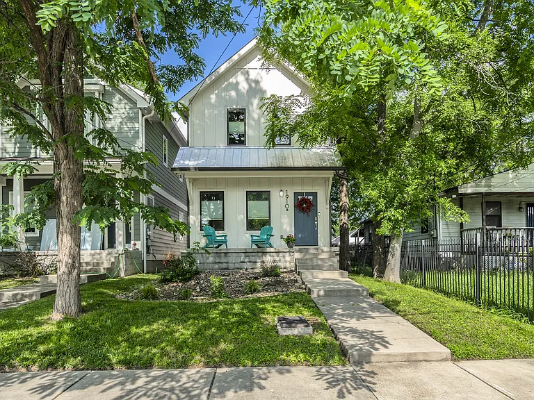 Welcoming front yard with a charming rock garden, covered porch, Adirondack seating, and green space to relax with your morning coffee. Plenty of free street parking is available for you and your guests.