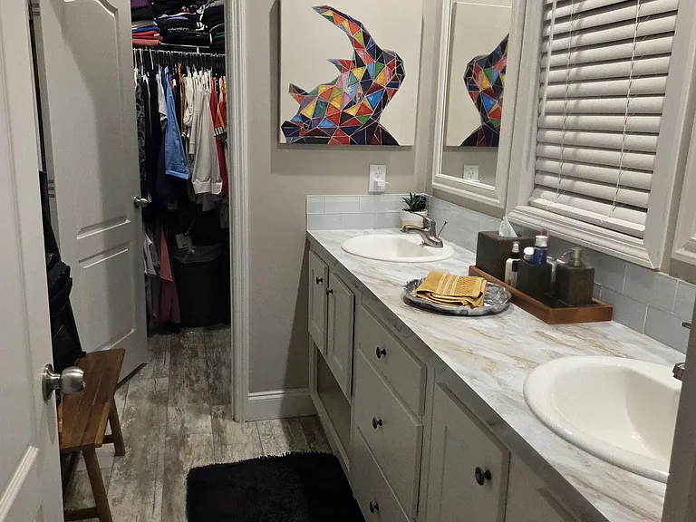 Master bathroom with shower, walk in closet