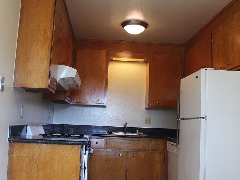 Granite Countertops and Dishwasher with Gas Range