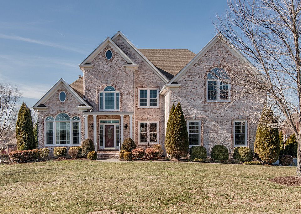 All brick on almost one acre