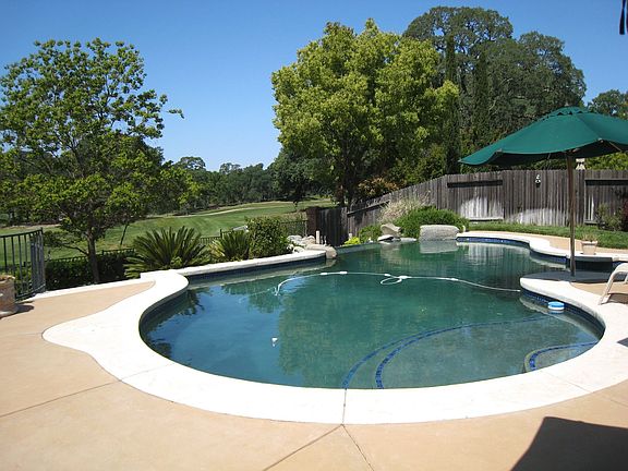 Infinity Edge pool over looking Woodcreek Golf Course