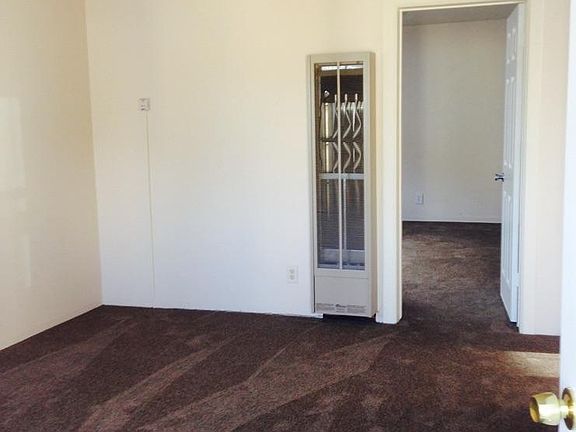 Living room, looking into bedroom