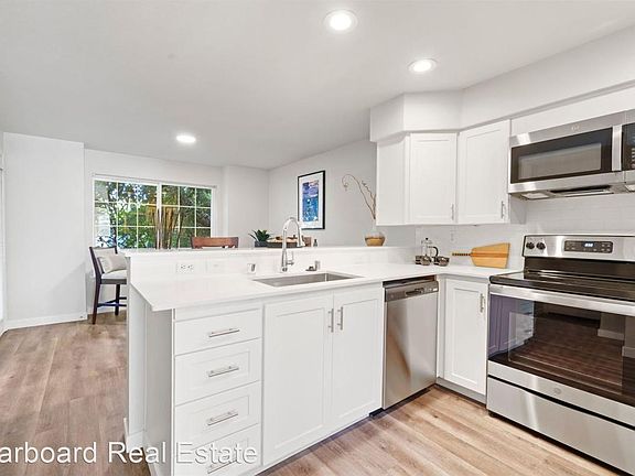 Open concept kitchen with granite countertops