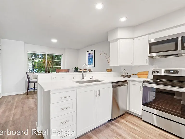 Open concept kitchen with granite countertops