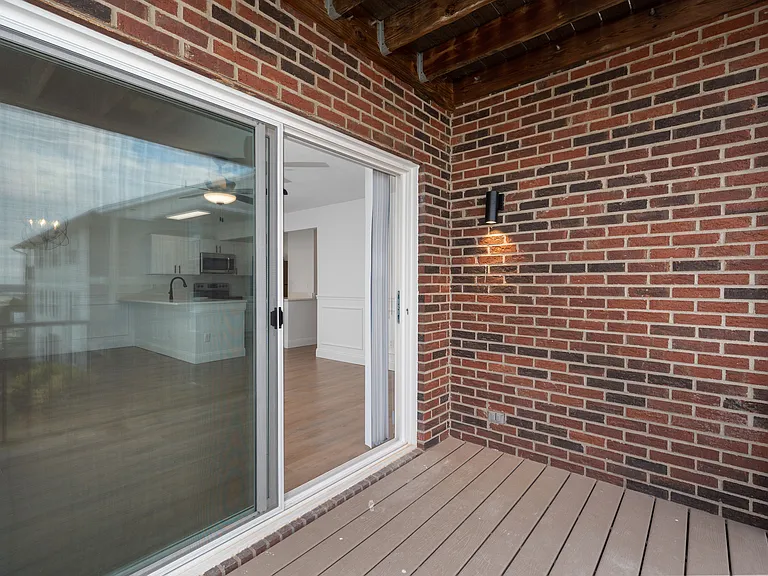 Step into an indoor-outdoor experience with this charming brick patio. Step into an indoor-outdoor experience with this charming brick patio.