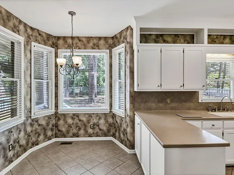 1100 Woodtree Ct — Photo 25