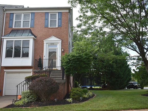 End Unit with lots of windows. Front and side yard view.