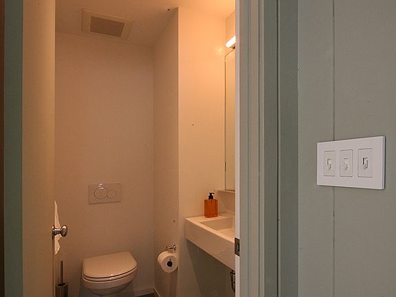 half bath off foyer