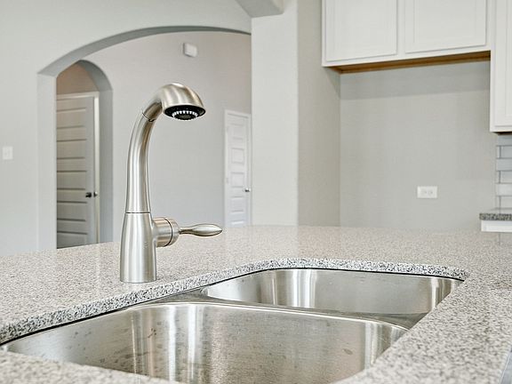 Stainless steel sink in kitchen