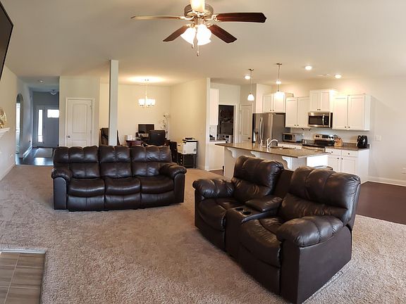 Another view of Great Room, kitchen, and dining room)