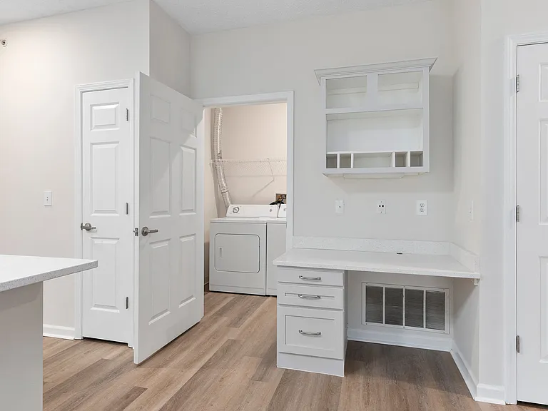 The Charleston Magnolia Premium Renovated Laundry room with Full Size washer and dryer included