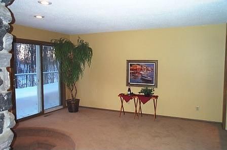 Main floor family room accesses deck.