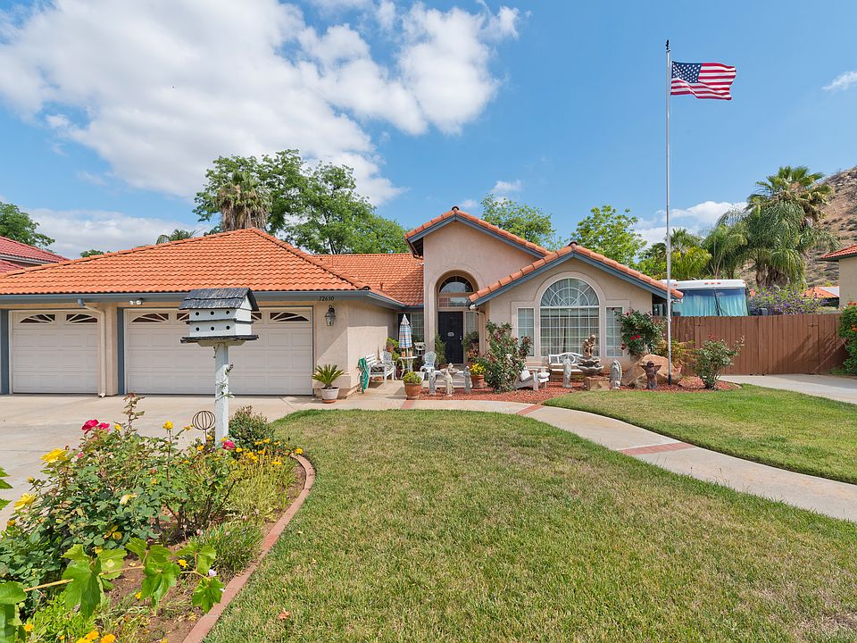 Front of Home With RV Prking