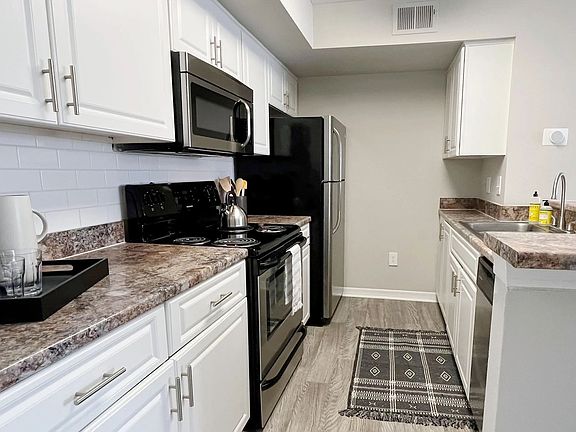 Our galley-style kitchens offer abundant cabinet space.