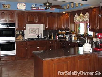 Large eat in kitchen : Cherry cabinets & granite counter tops
