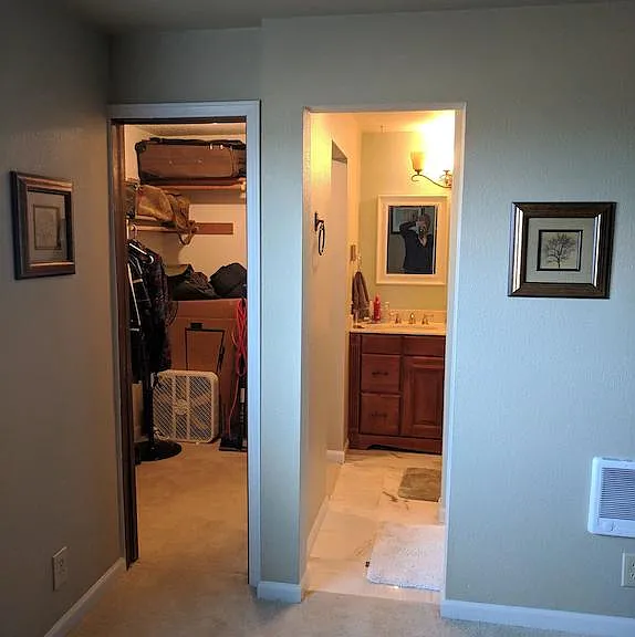 Bedroom #2 entrance to attached bathroom and walk-in closet.