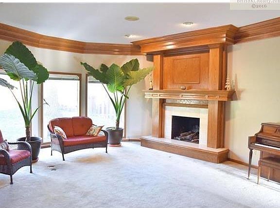 Huge Windows - Oak Mantel above the Wood Burning Fireplace!