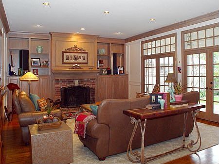 Large, bright family room with fireplace and wet bar