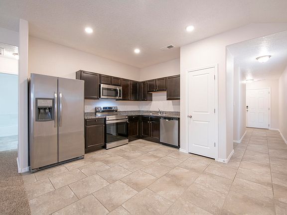 5th image of 9320 Sandia Sunset St NW