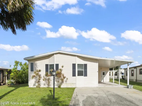 720 Periwinkle Cir, Barefoot Bay, FL 32976