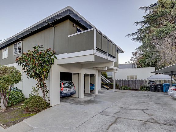 Back of the building and 2 parking with 2 storage