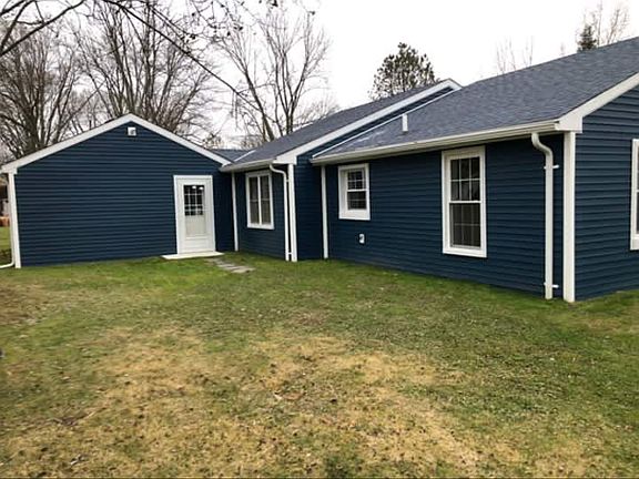 Back up garage, side of hous