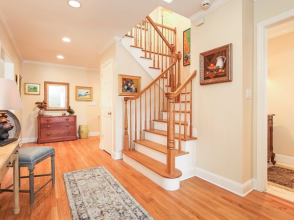 Gracious Entry Hall with Staircase to Upper Level