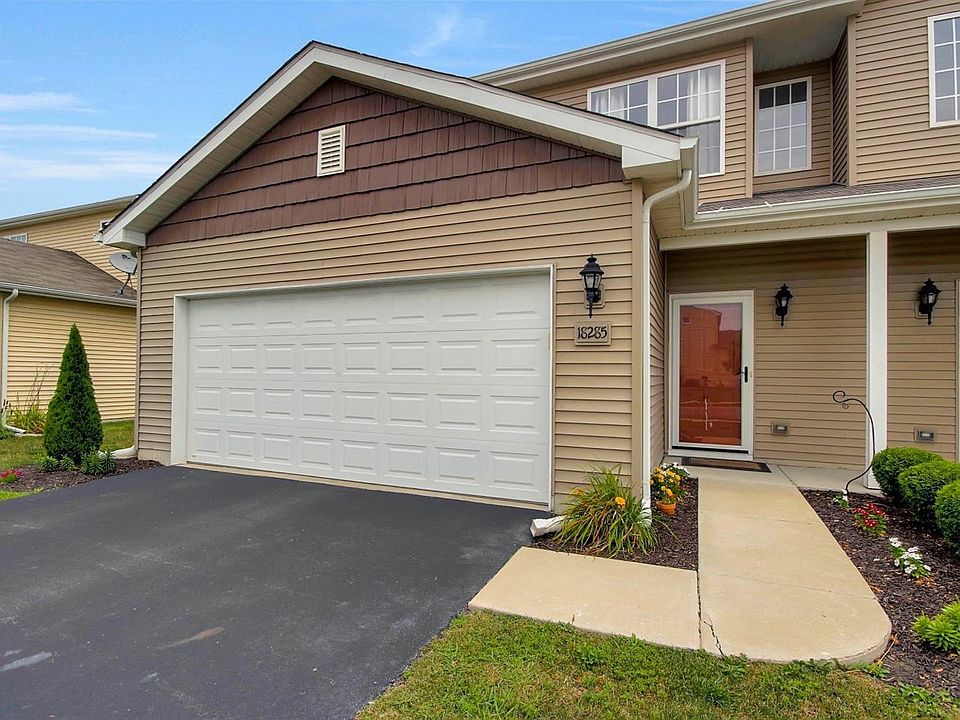 EXTERIOR OF THE HOME w/UPGRADED STORM DOOR!