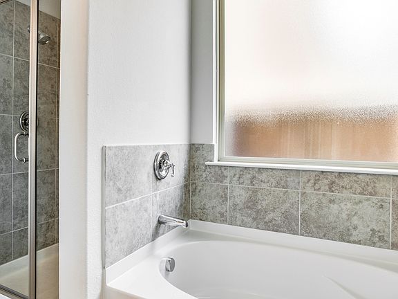 Large shower and relaxing tub