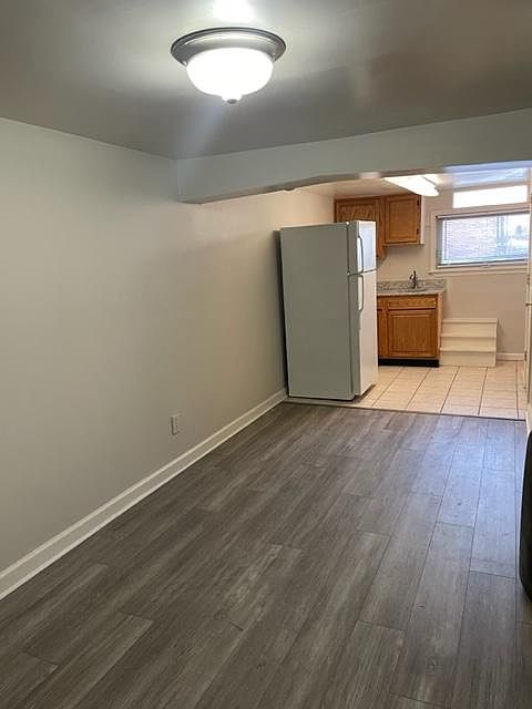 New gray vinyl plank flooring as well as Agreeable Gray paint.
