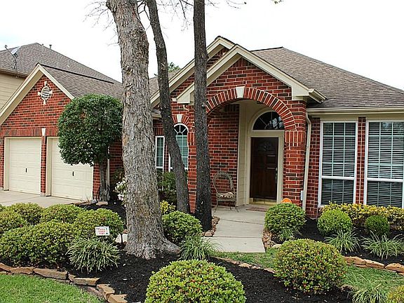 Beautiful landscaping in the front yard. Front porch is covered . Double pane windows. 2 car garage.