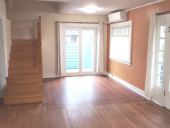 Large front room with new AC split unit.