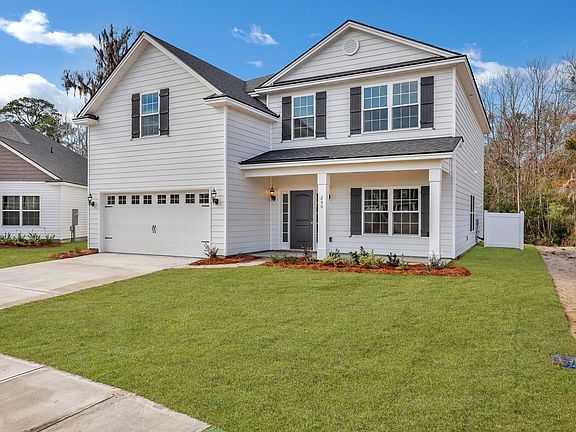 Front Elevation A with optional extended front porch of Nantucket plan built by Ernest Homes