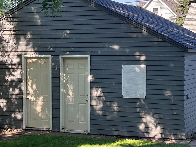Two-car garage - one stall for each apartment