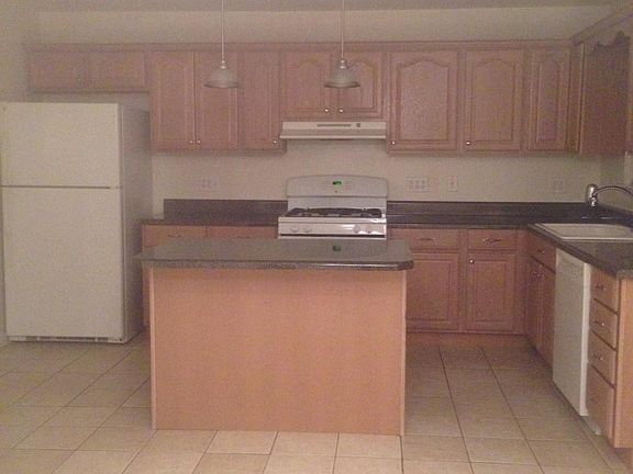 White washed oak cabinets with Island and Pendent Lights, Lo