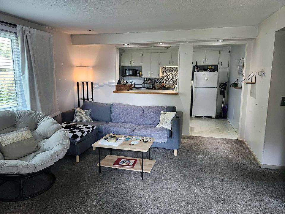 Step into a welcoming living room that greets you the moment you walk through the front door.