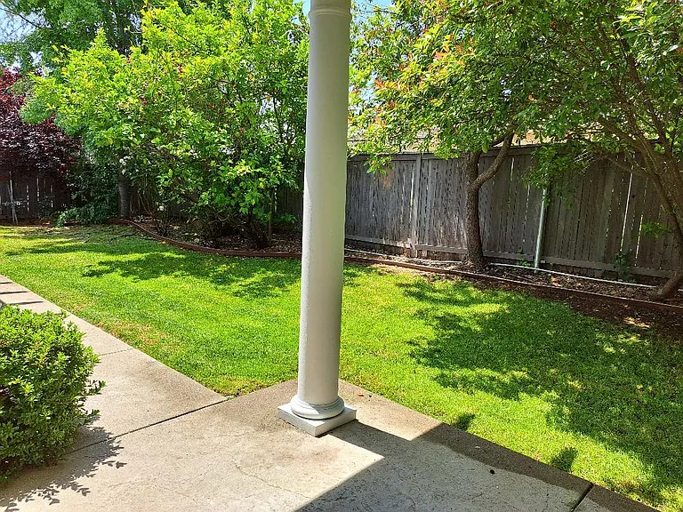 Sliding doors to backyard off of kitchen and master bedroom