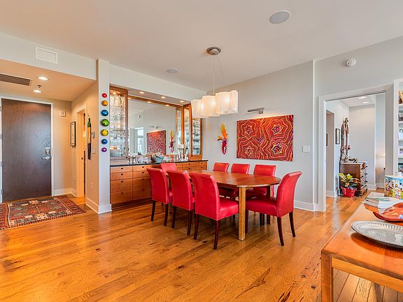 Entry door and powder room on right.